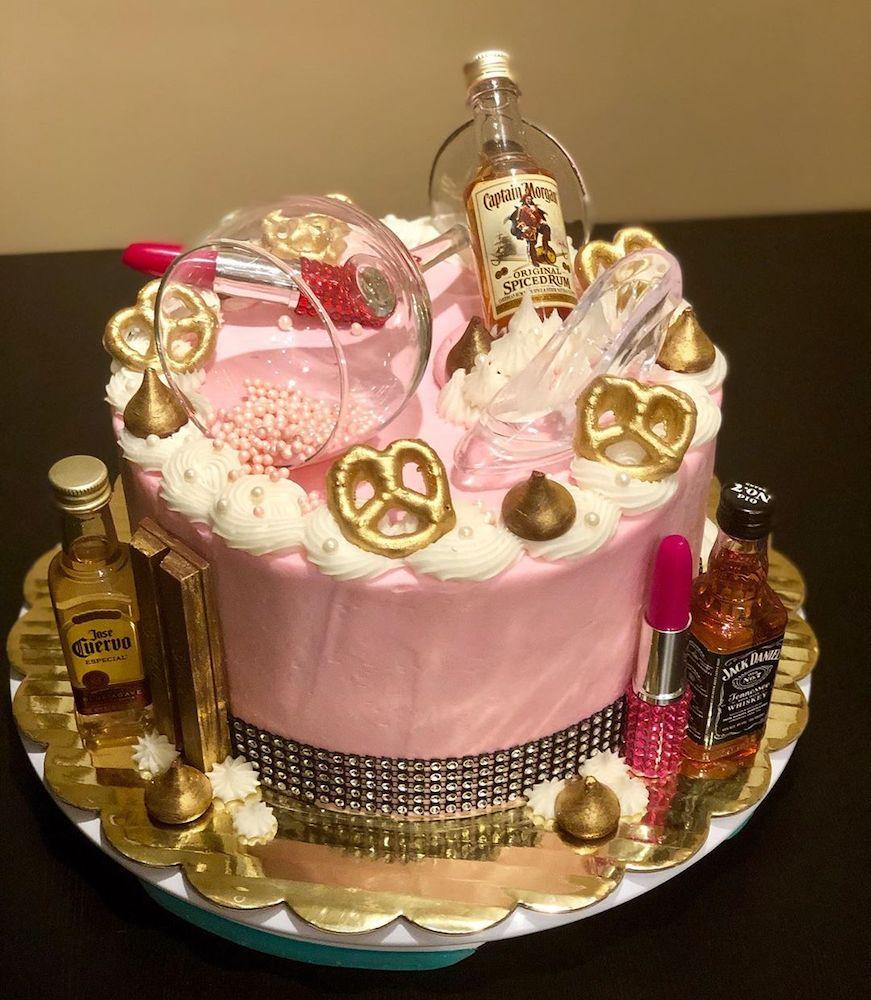 beautiful sexy birthday cake with minibar alcohol bottles from tinley park cake boss dria