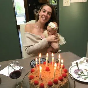 Mommy Holding Eileah Before Bowing Out Her Birthday Cake Candles