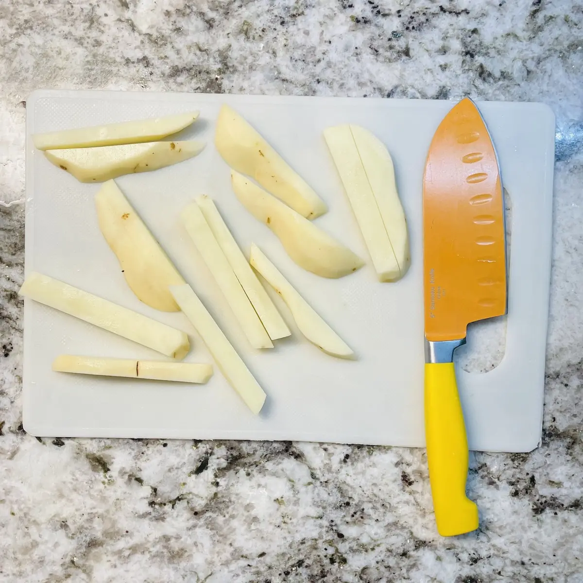 Oven French Fries Step 1 Cutting Board